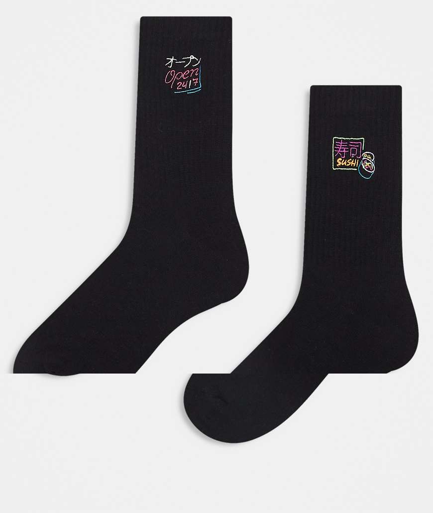 ASOS DESIGN - 2er-Pack Socken in Weiß mit Leuchtschild-Stickerei ASOS DESIGN - 2er-Pack Socken in Weiß mit Leuchtschild-Stickerei von ASOS DESIGN
