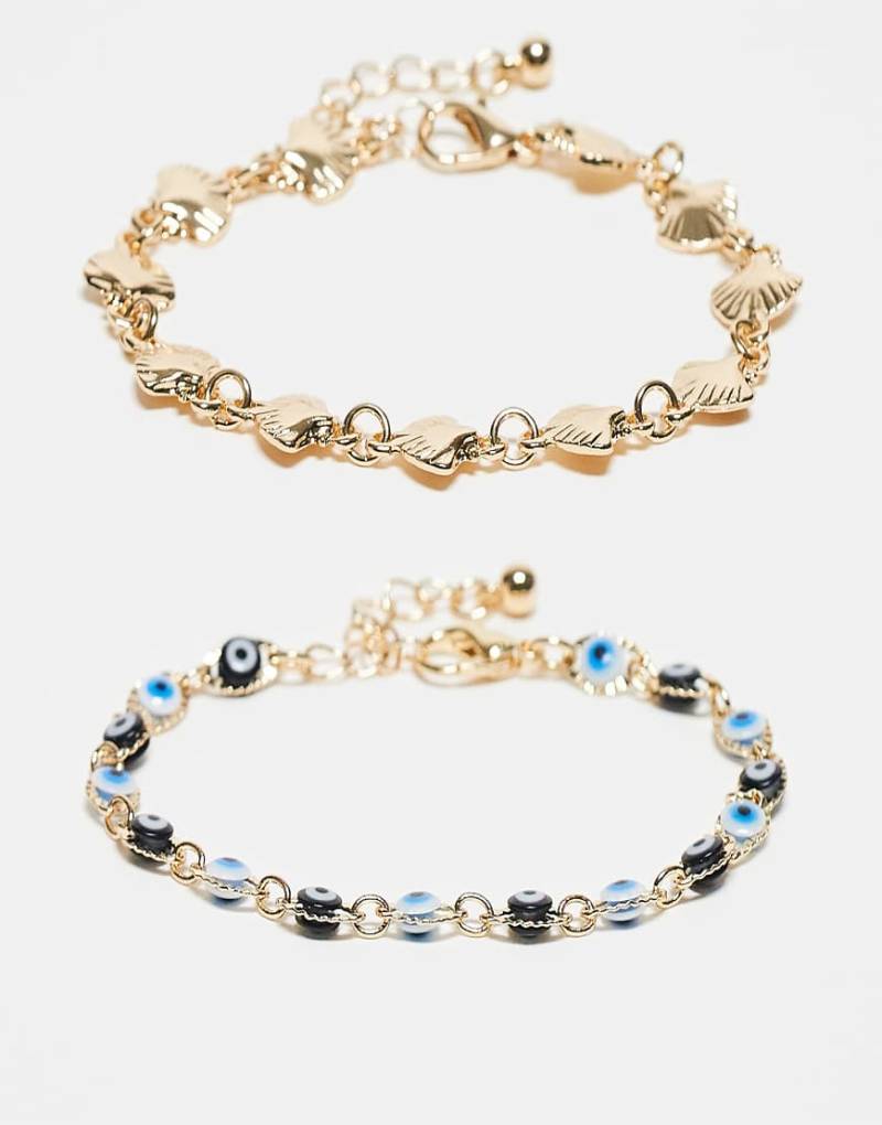 ASOS DESIGN - 2er-Pack goldfarbene Armbänder mit Kunstmuschel- und Augendesign von ASOS DESIGN