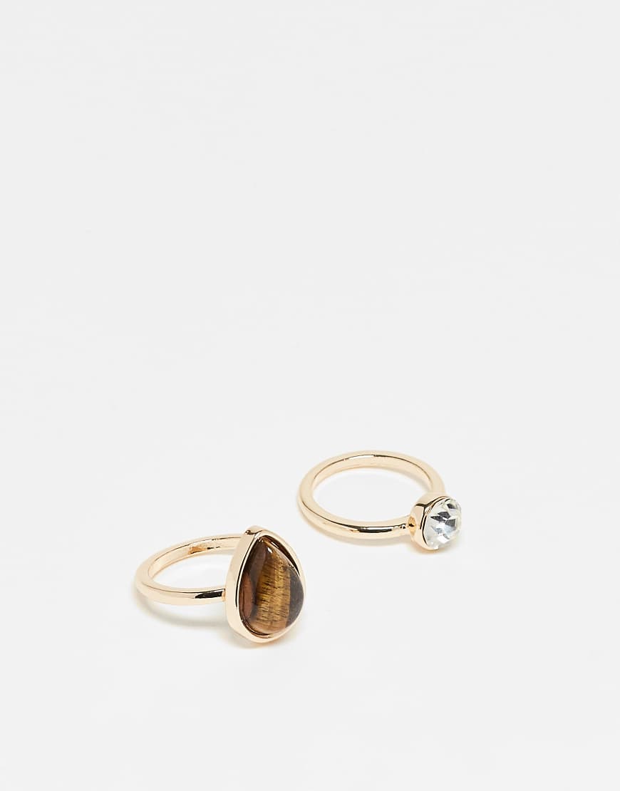 ASOS DESIGN - 2er-Pack goldfarbene Ringe mit echtem Tigerauge-Stein ASOS DESIGN - 2er-Pack goldfarbene Ringe mit echtem Tigerauge-Stein von ASOS DESIGN