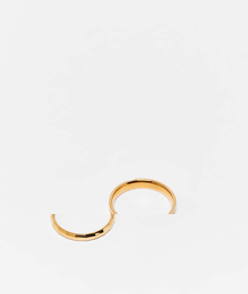 ASOS DESIGN - 2er-Pack schmale Bandringe aus wasserfestem Edelstahl in Gold mit Schmuckstein-Goldfarben ASOS DESIGN - 2er-Pack schmale Bandringe aus wasserfestem Edelstahl in Gold mit Schmuckstein-Goldfarben von ASOS DESIGN