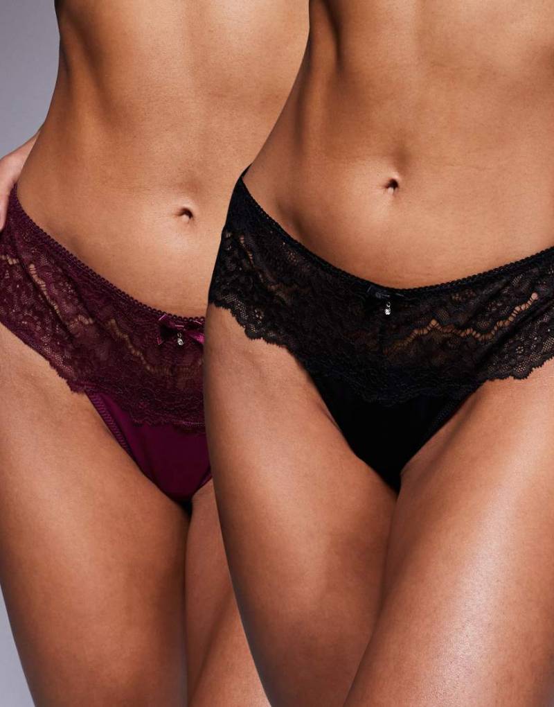 ASOS DESIGN - 2er-Pack sitzende Spitzen-Strings in Schwarz und Burgunderrot-Bunt von ASOS DESIGN