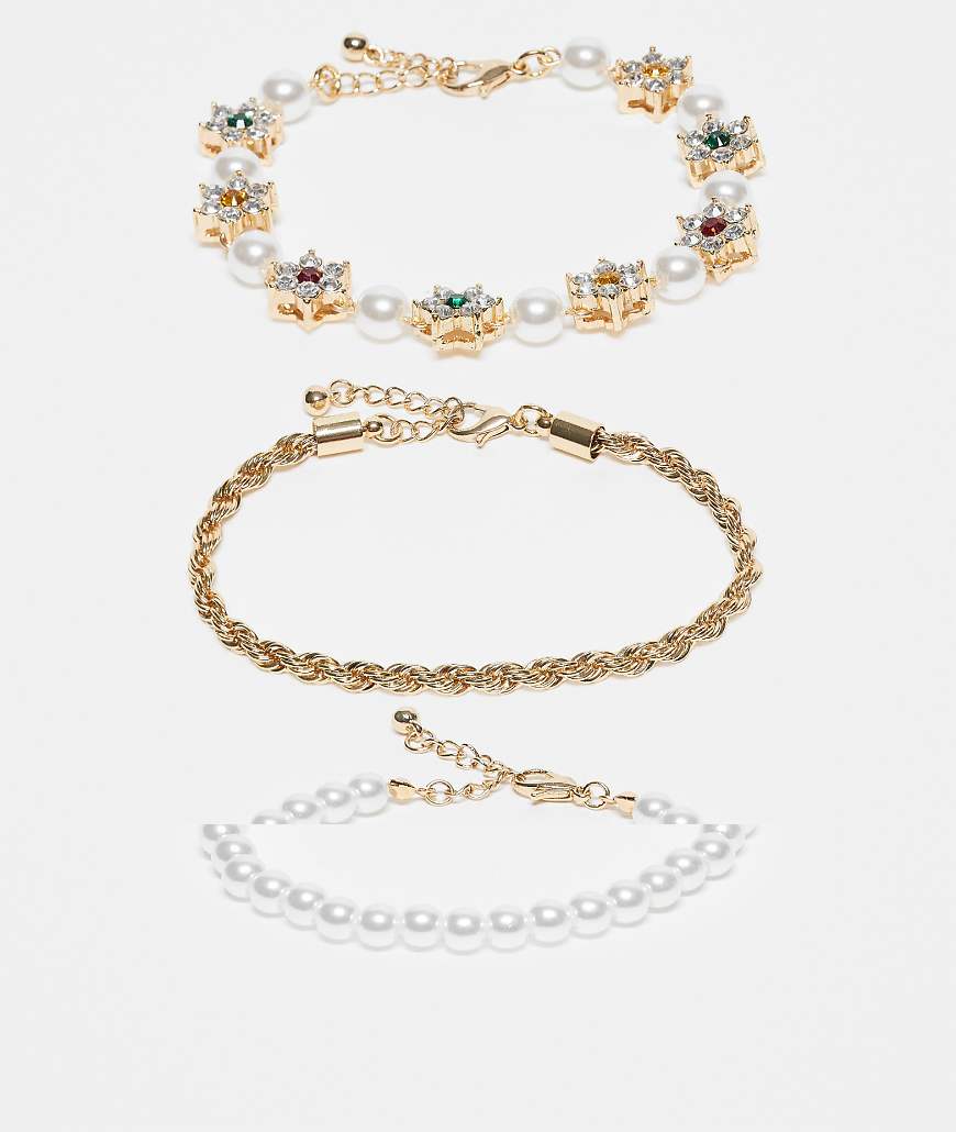 ASOS DESIGN - 3er-Pack Armbänder mit Strasssternen und Perlen-Goldfarben von ASOS DESIGN