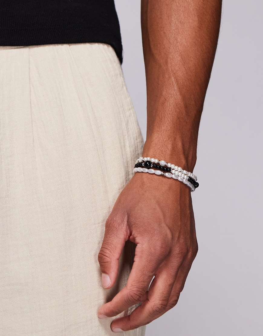 ASOS DESIGN - 3er-Pack Armbänder mit Kunstperlen in Cremeweiß ASOS DESIGN - 3er-Pack Armbänder mit Kunstperlen in Cremeweiß von ASOS DESIGN