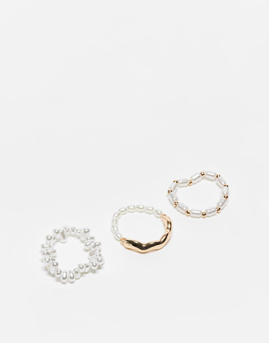 ASOS DESIGN - 3er-Pack Ringe mit winzigen Zierperlen-Goldfarben ASOS DESIGN - 3er-Pack Ringe mit winzigen Zierperlen-Goldfarben von ASOS DESIGN