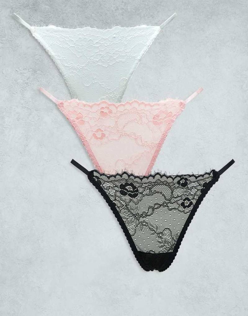 ASOS DESIGN - 3er-Pack String-Tangas aus Spitze in Schwarz, Weiß und Staubrosa-Bunt von ASOS DESIGN