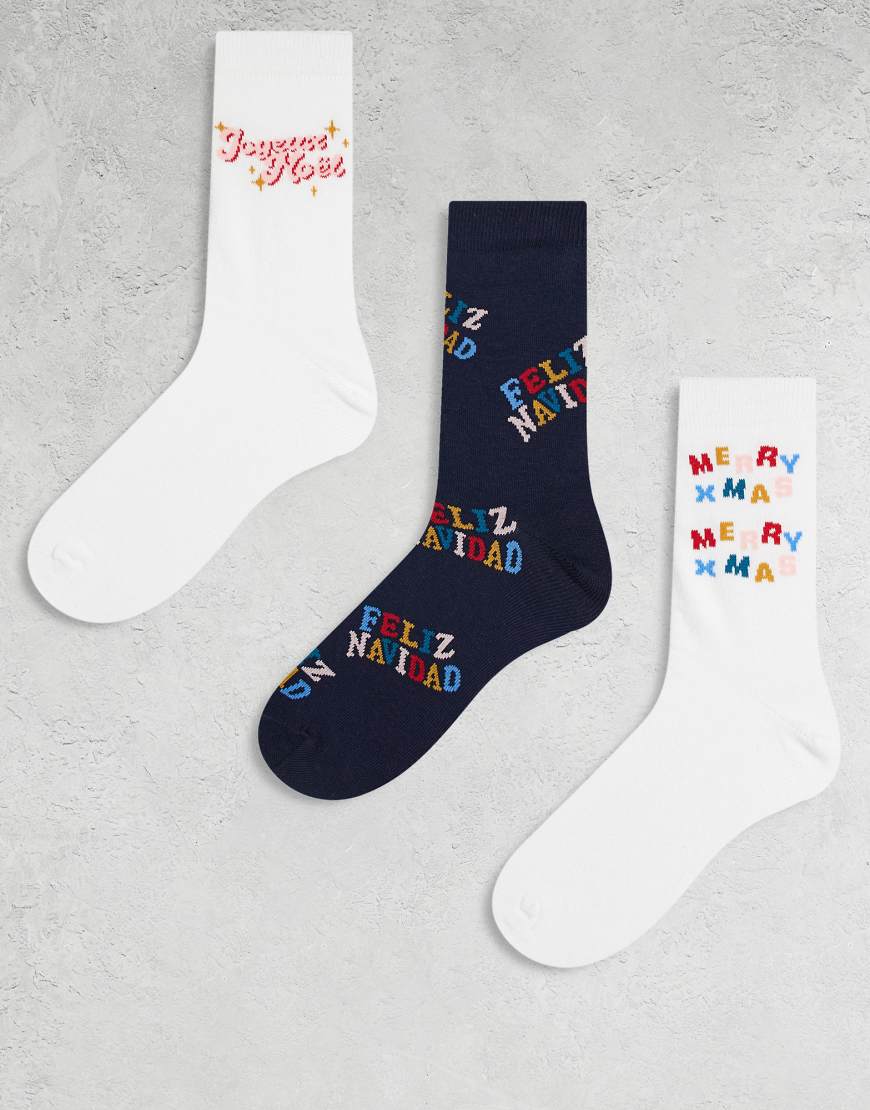 ASOS DESIGN - 3er-Pack bunte Socken mit weihnachtlichen „Feliz Navidad"-Motiven-Weiß ASOS DESIGN - 3er-Pack bunte Socken mit weihnachtlichen „Feliz Navidad"-Motiven-Weiß von ASOS DESIGN