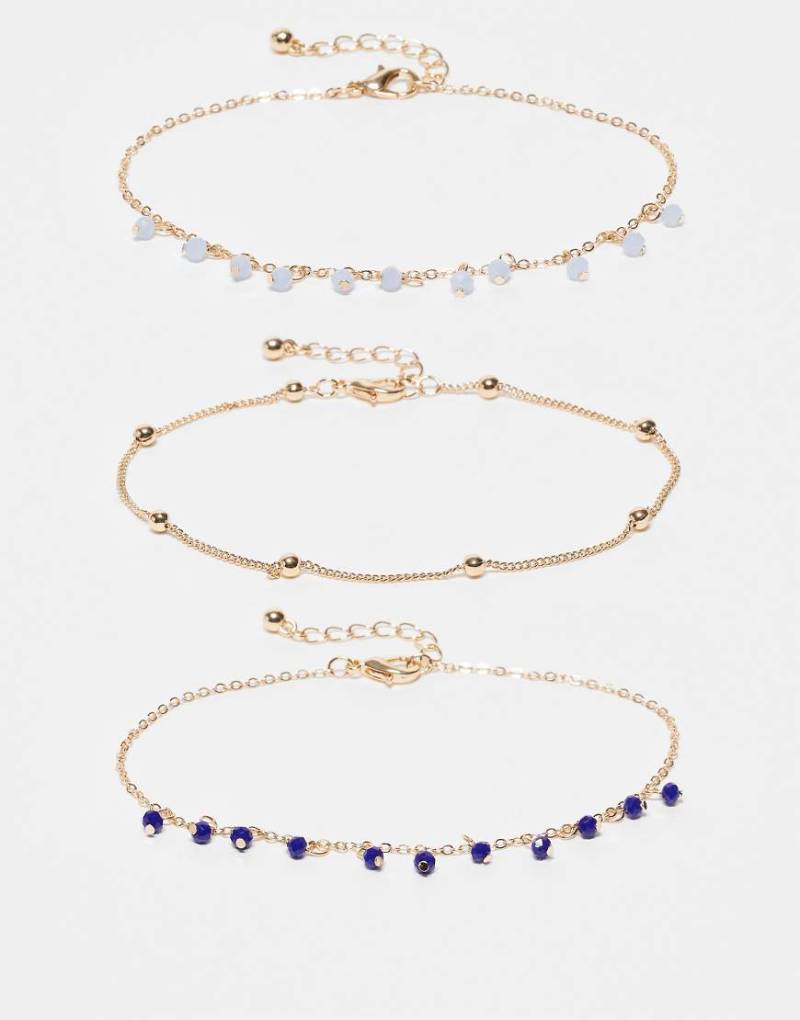 ASOS DESIGN - 3er-Pack goldfarbene Fußkettchen mit Perlenanhängern von ASOS DESIGN