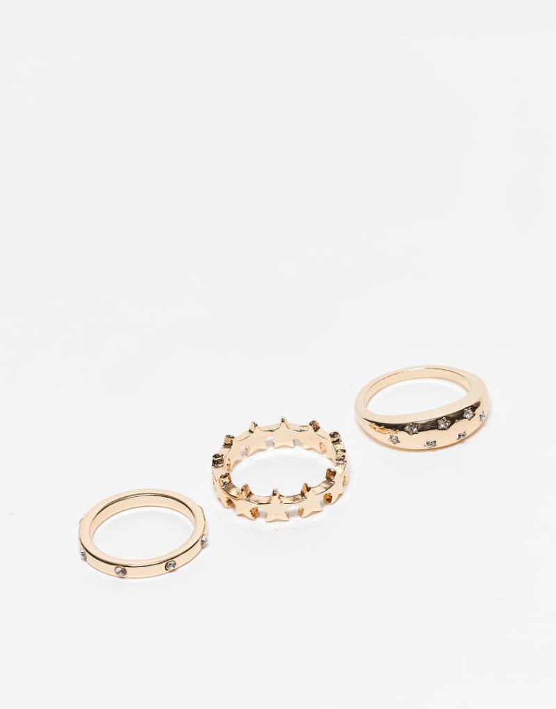 ASOS DESIGN - 3er-Pack goldfarbene Ringe mit Himmelskörper-Design von ASOS DESIGN