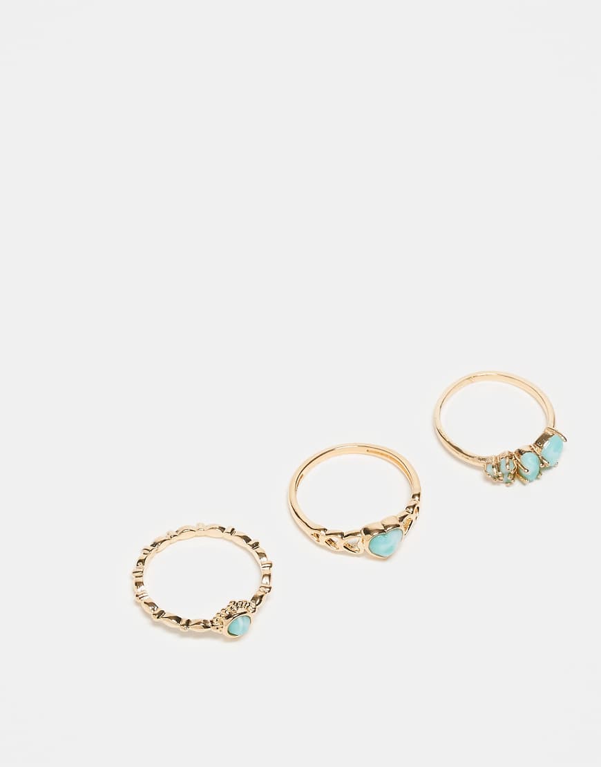 ASOS DESIGN - 3er-Pack goldfarbene Ringe mit Kunststeinen von ASOS DESIGN