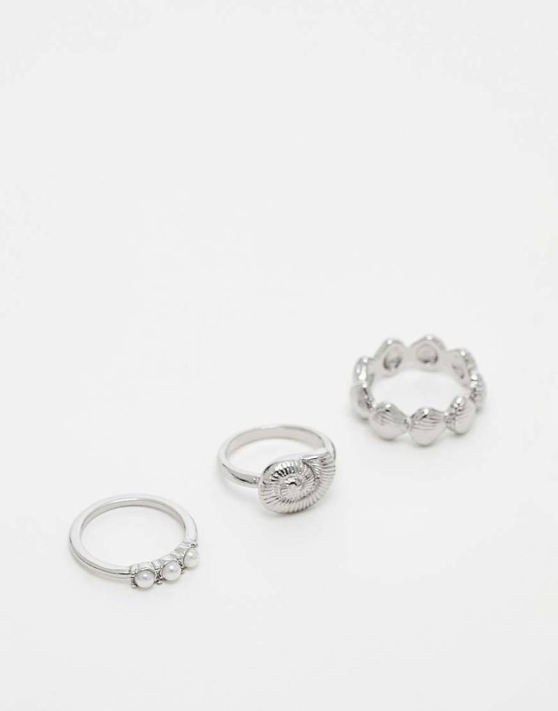 ASOS DESIGN - 3er-Pack silberfarbene Ringe mit Kunstperlen- und Muscheldesign von ASOS DESIGN