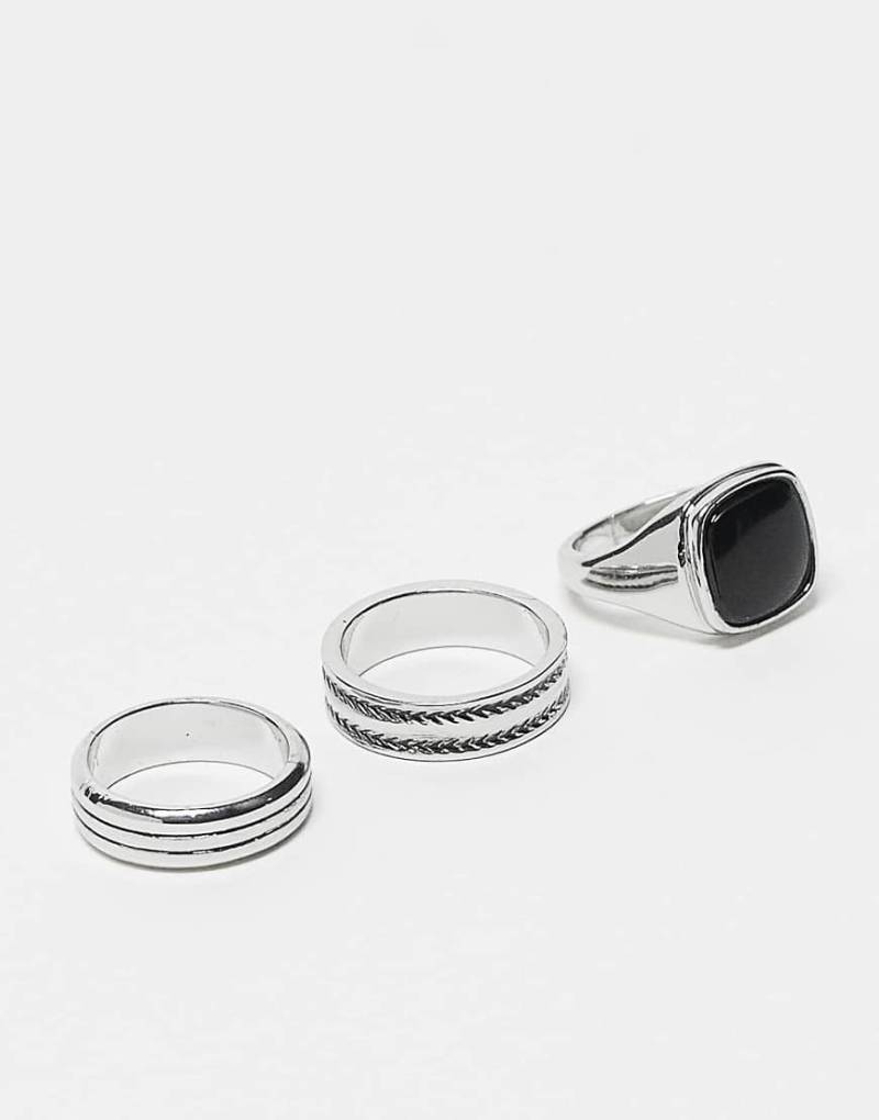 ASOS DESIGN - 3er-Pack silberfarbene Ringe mit geprägtem Design und schwarzem Schmuckstein von ASOS DESIGN