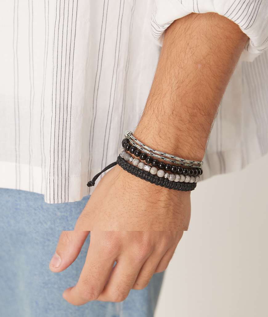 ASOS DESIGN - 4er-Pack Armbänder mit mehrfarbigen Halbedelstein-Perlen aus Jaspis und Obsidian sowie im Picasso-Design-Bunt von ASOS DESIGN