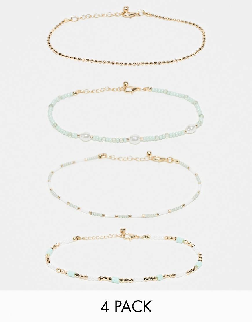 ASOS DESIGN - 4er-Pack Fußkettchen mit grünem und goldenem Perlendesign-Bunt von ASOS DESIGN