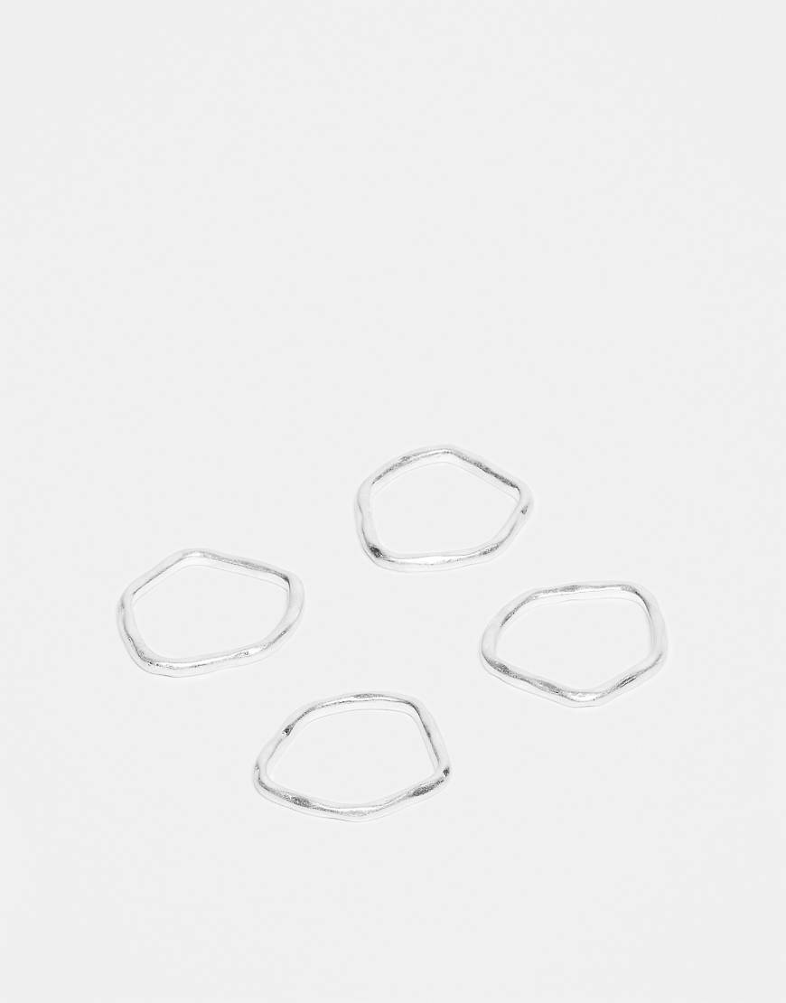 ASOS DESIGN - 4er-Pack schlichte Ringe mit Used-Silberoptik und geschmolzenem Design von ASOS DESIGN