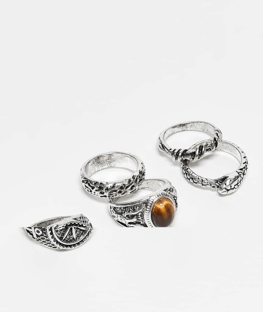ASOS DESIGN - 5er-Pack Ringe in polierter Silberoptik mit Kompass-Motiv und Stein in Tigerauge-Optik ASOS DESIGN - 5er-Pack Ringe in polierter Silberoptik mit Kompass-Motiv und Stein in Tigerauge-Optik von ASOS DESIGN