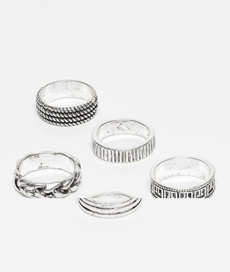 ASOS DESIGN - 5er-Pack silberfarbene Ringe mit griechischem und strukturiertem Muster von ASOS DESIGN