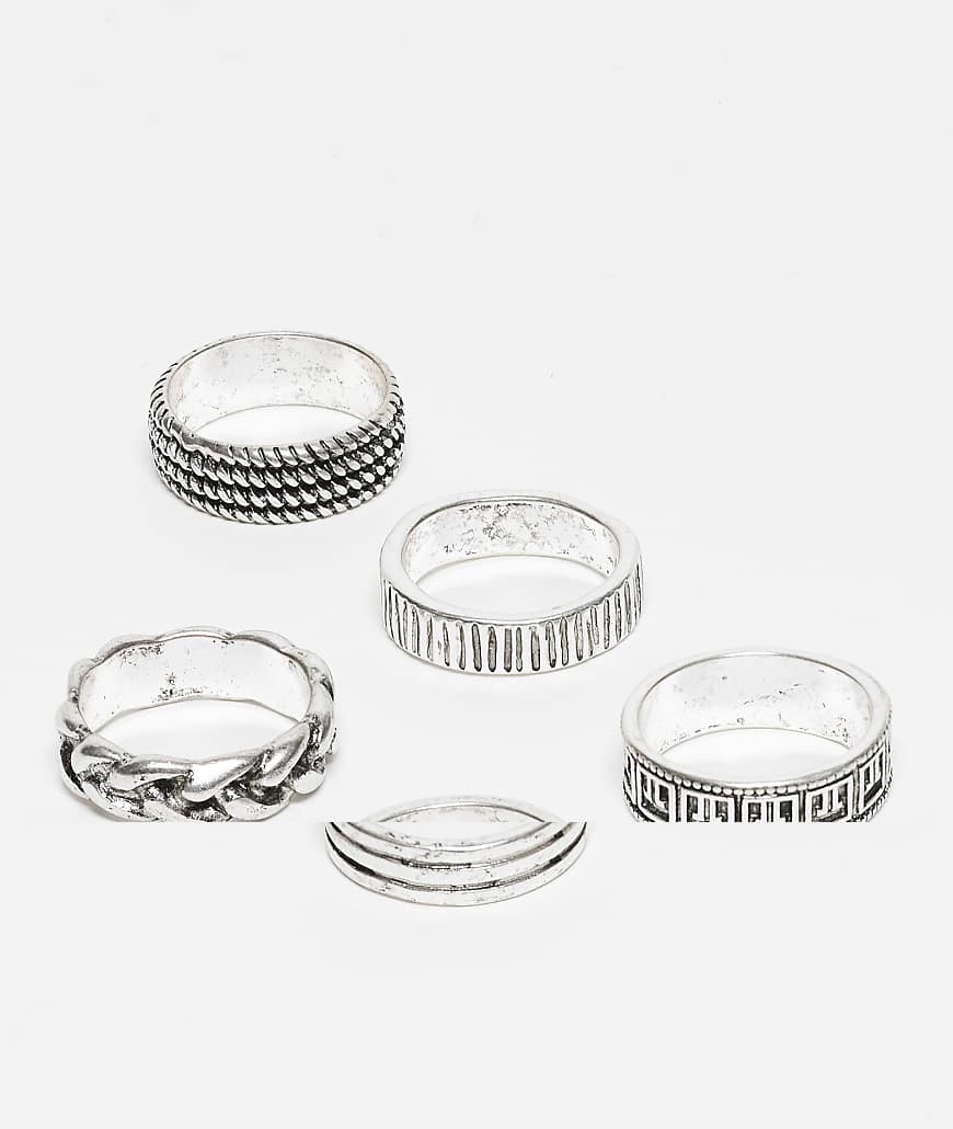 ASOS DESIGN - 5er-Pack silberfarbene Ringe mit griechischem und strukturiertem Muster von ASOS DESIGN