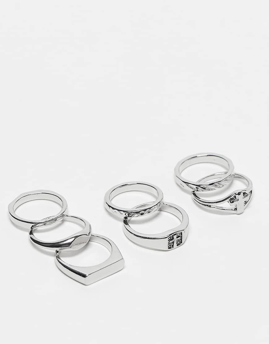ASOS DESIGN - 7er-Pack silberfarbene Ringe in verschiedenen Designs und in Kreuzoptik von ASOS DESIGN