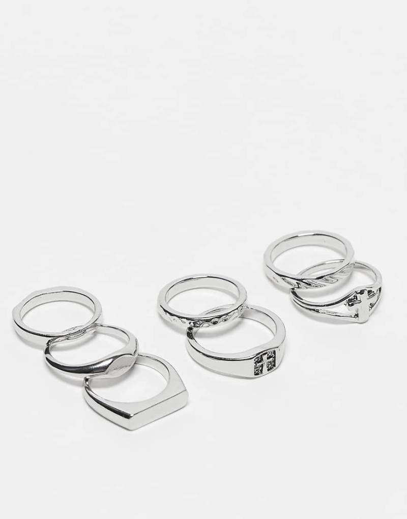 ASOS DESIGN - 7er-Pack silberfarbene Ringe in verschiedenen Designs und in Kreuzoptik von ASOS DESIGN