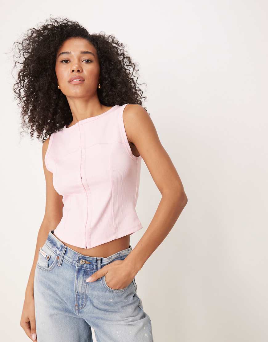 ASOS DESIGN - Ärmelloses Oberteil in Rosa mit Knopfleiste von ASOS DESIGN