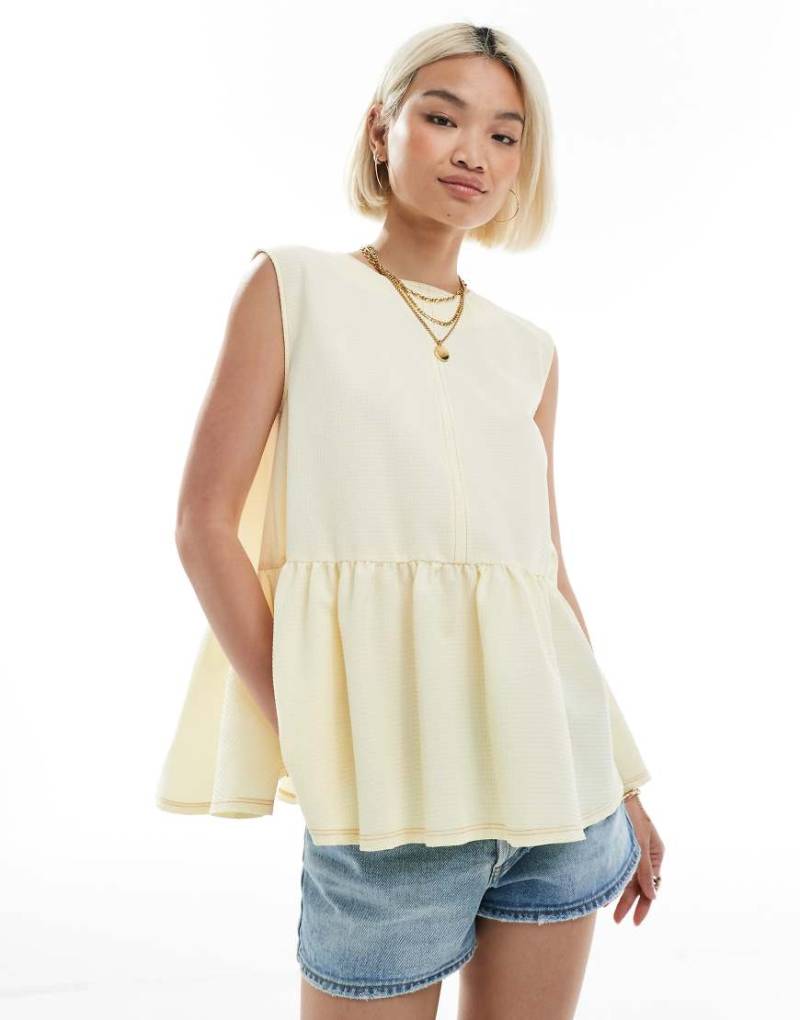 ASOS DESIGN - Ärmelloses Schößchenoberteil in Gelb mit Bindebändern hinten von ASOS DESIGN