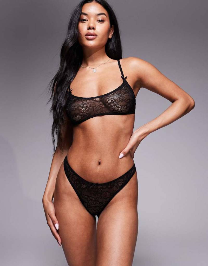 ASOS DESIGN - Alice - Spitzen-Tanga in Schwarz mit hohem Beinausschnitt von ASOS DESIGN