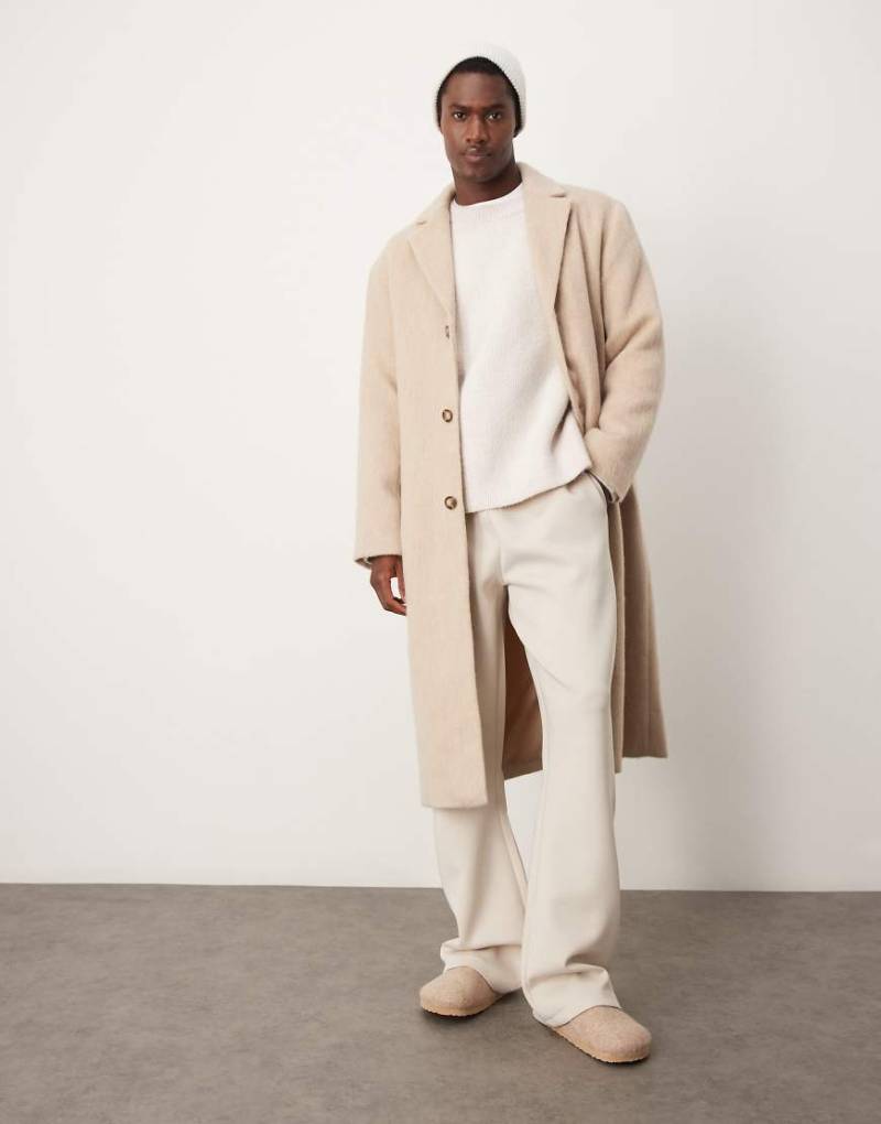 ASOS DESIGN - Angerauter Mantel in steinbeiger Woll-Optik-Neutral von ASOS DESIGN