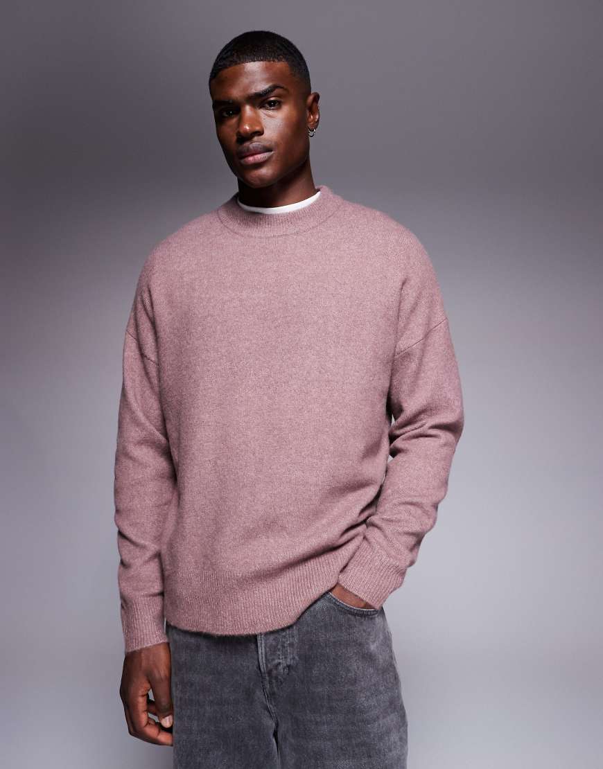 ASOS DESIGN - Angerauter Oversize-Strickpullover in Mauve mit Rundhalsausschnitt-Rosa von ASOS DESIGN