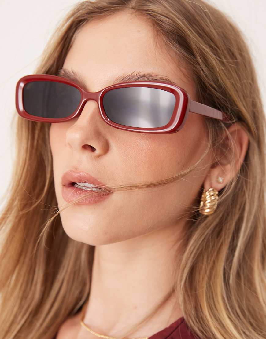 ASOS DESIGN - Angeschrägte, eckige Sonnenbrille in glänzendem Rot mit schmalem Design von ASOS DESIGN