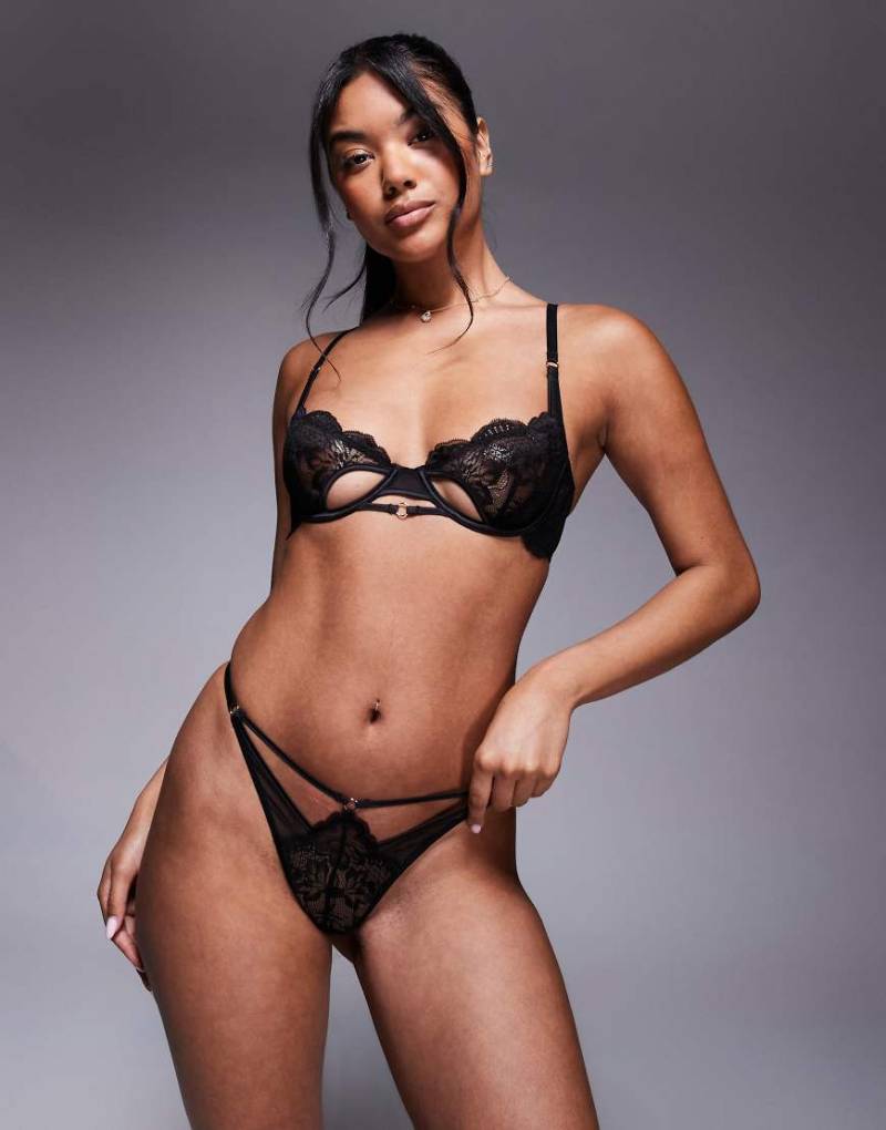 ASOS DESIGN - Anika - Stringtanga aus Spitze und Mesh in Schwarz mit Ringdetails und Cut-Outs-Blau von ASOS DESIGN