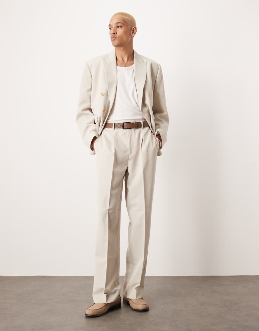 ASOS DESIGN - Anzughose in Kieselbeige mit weitem Bein-Grau ASOS DESIGN - Anzughose in Kieselbeige mit weitem Bein-Grau von ASOS DESIGN