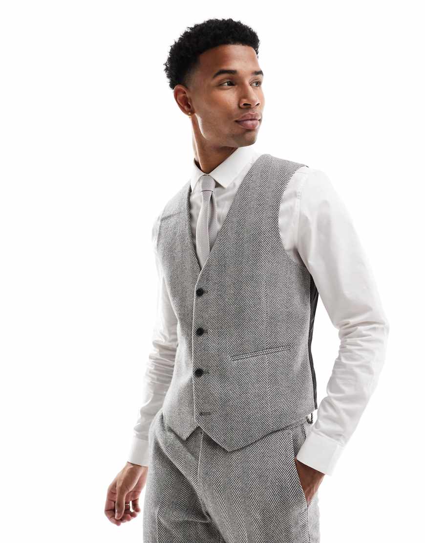 ASOS DESIGN - Anzugweste aus Wollmix in Grau mit engem Schnitt und Fischgrätmuster ASOS DESIGN - Anzugweste aus Wollmix in Grau mit engem Schnitt und Fischgrätmuster von ASOS DESIGN