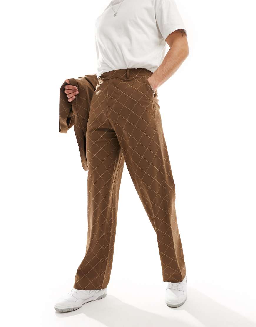 ASOS DESIGN - Asymmetrisch geschnittene Anzughose in Braun kariert mit weitem Bein ASOS DESIGN - Asymmetrisch geschnittene Anzughose in Braun kariert mit weitem Bein von ASOS DESIGN