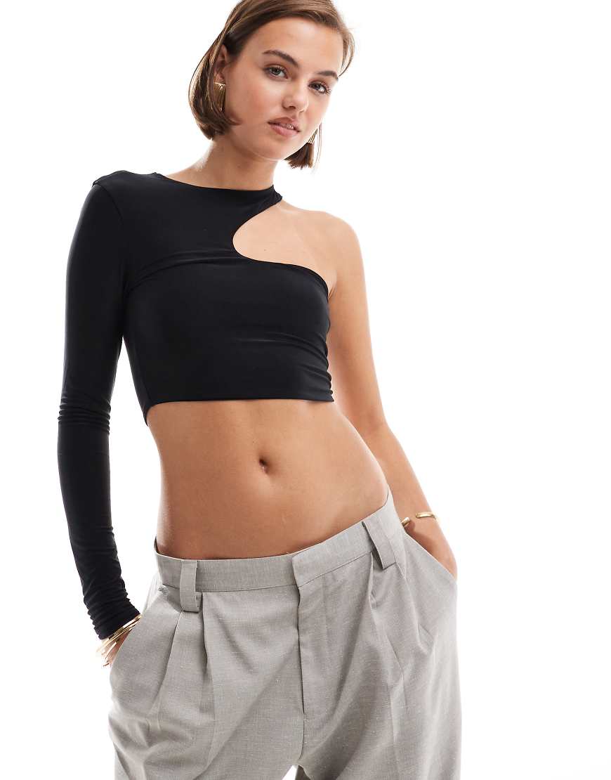 ASOS DESIGN - Asymmetrisch geschnittenes Oberteil in Schwarz mit Zierausschnitt und einem langen Ärmel ASOS DESIGN - Asymmetrisch geschnittenes Oberteil in Schwarz mit Zierausschnitt und einem langen Ärmel von ASOS DESIGN