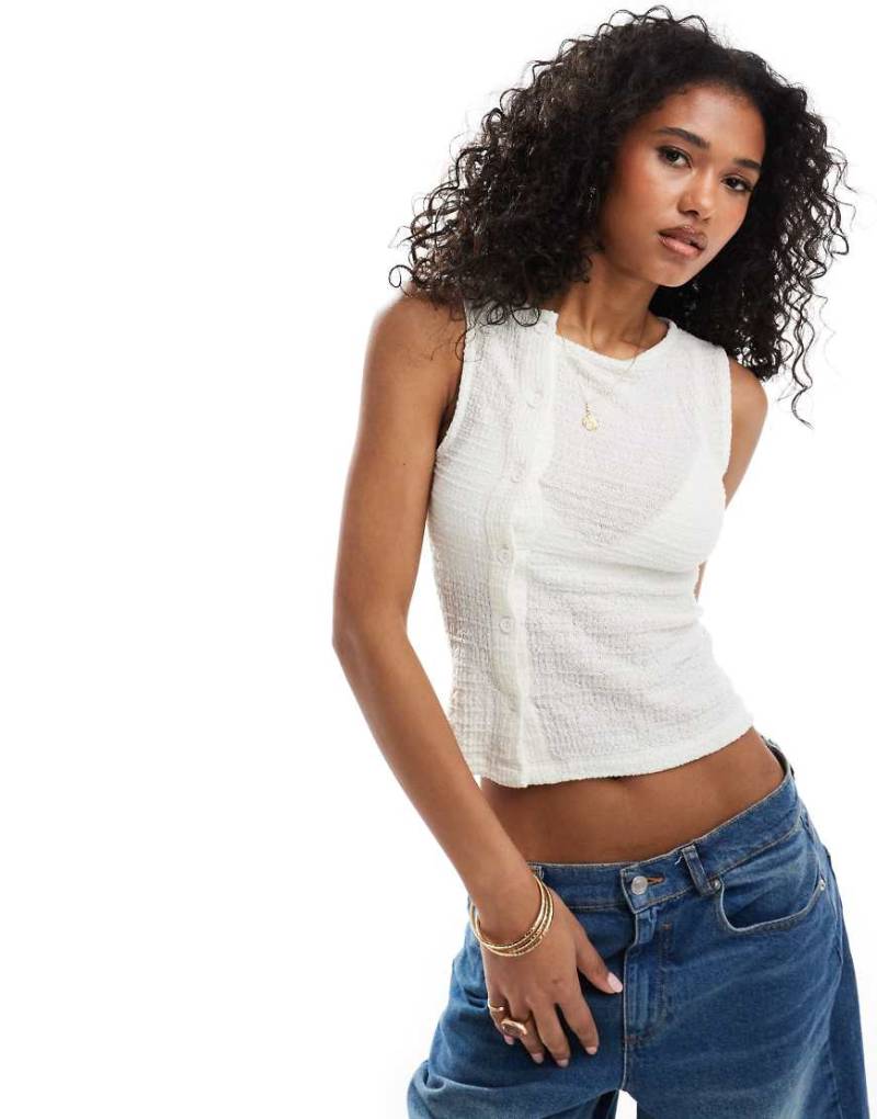 ASOS DESIGN - Asymmetrische strukturierte Weste in Elfenbein-Weiß von ASOS DESIGN