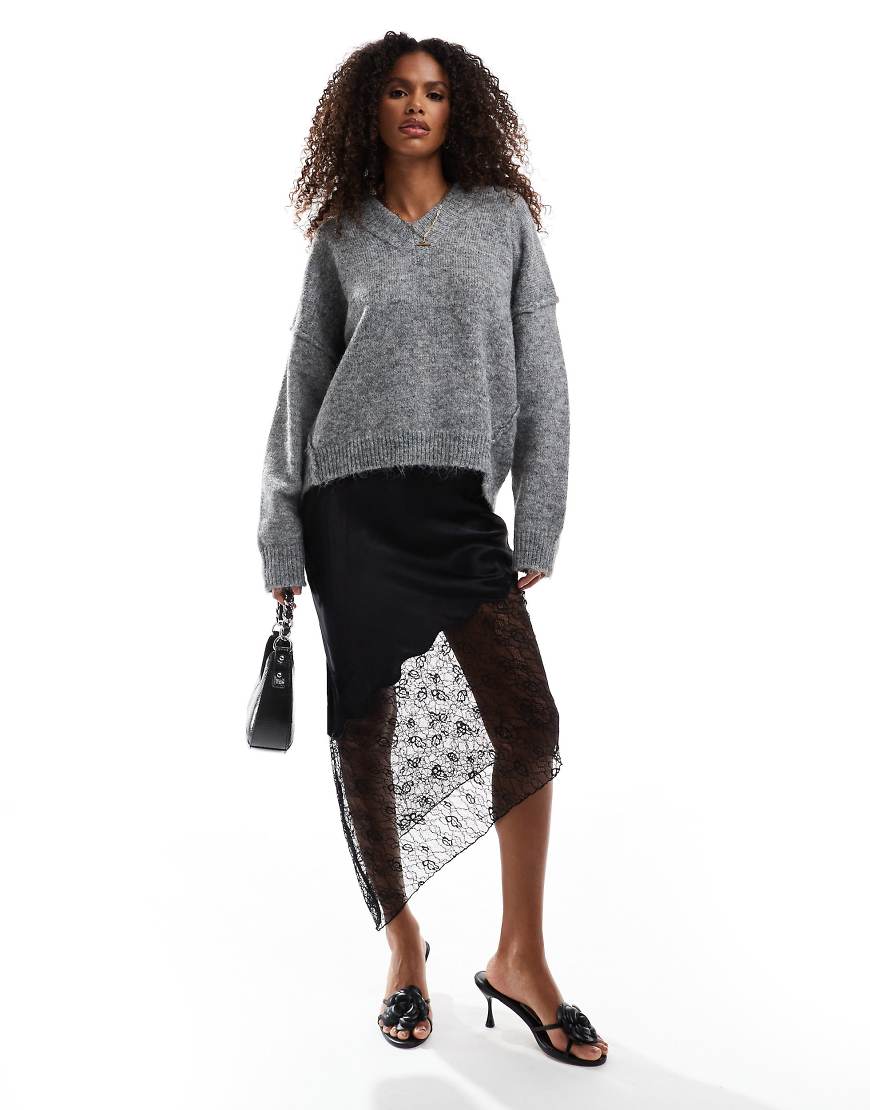 ASOS DESIGN - Asymmetrischer Maxirock aus Satin-Spitzenmix in Schwarz ASOS DESIGN - Asymmetrischer Maxirock aus Satin-Spitzenmix in Schwarz von ASOS DESIGN