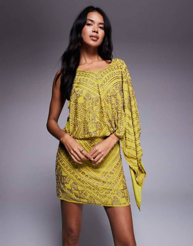 ASOS DESIGN - Asymmetrisches Minikleid in Chartreusegelb mit durchgehender Verzierung und Cape-Detail-Grün von ASOS DESIGN