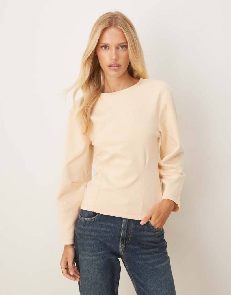 ASOS DESIGN - Ausgestelltes Oversize-T-Shirt aus Interlock-Stoff in Buttermilchgelb-Grün von ASOS DESIGN