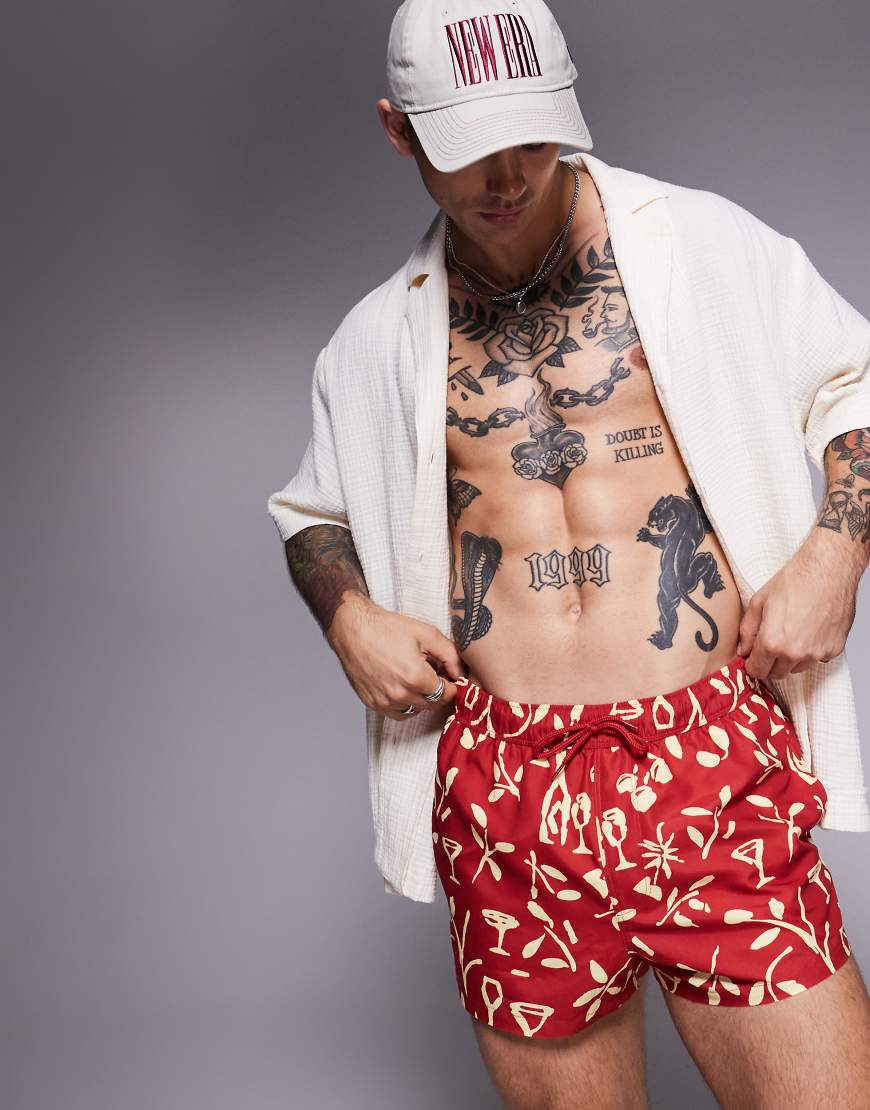 ASOS DESIGN - Badeshorts in superkurzer Länge mit Blumenprint in Rot ASOS DESIGN - Badeshorts in superkurzer Länge mit Blumenprint in Rot von ASOS DESIGN