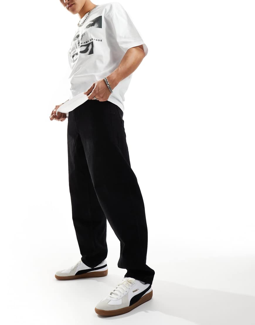ASOS DESIGN - Baggy-Jeans in Schwarz mit Abnähern von ASOS DESIGN