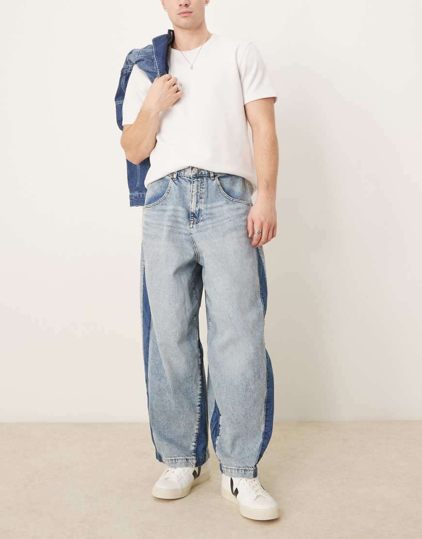 ASOS DESIGN - Weite Oversize-Jeans in Mittelblau mit Seitenbahnen ASOS DESIGN - Weite Oversize-Jeans in Mittelblau mit Seitenbahnen von ASOS DESIGN