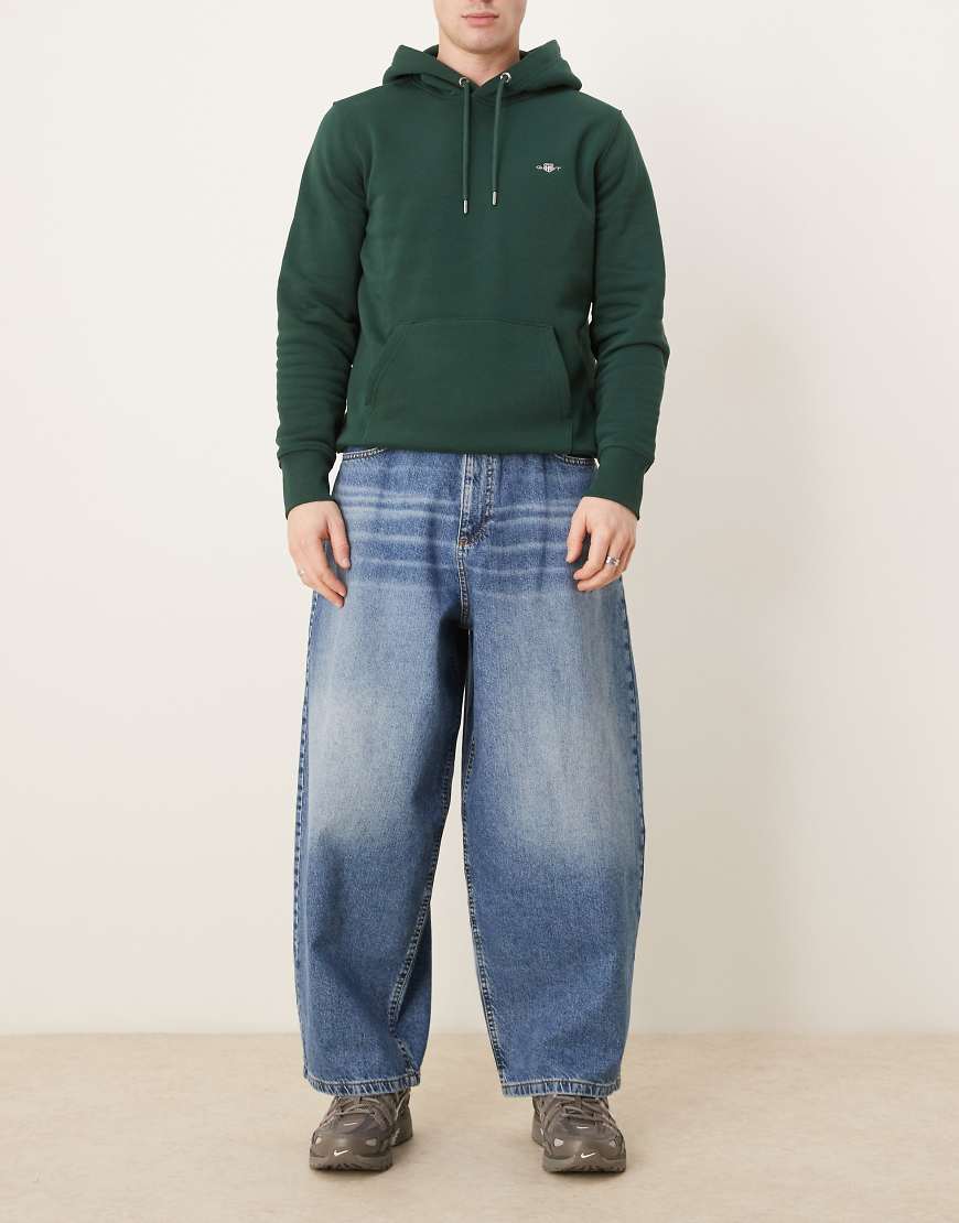 ASOS DESIGN - Weite Oversize-Jeans in verwaschenem Hellblau mit Farbstich von ASOS DESIGN