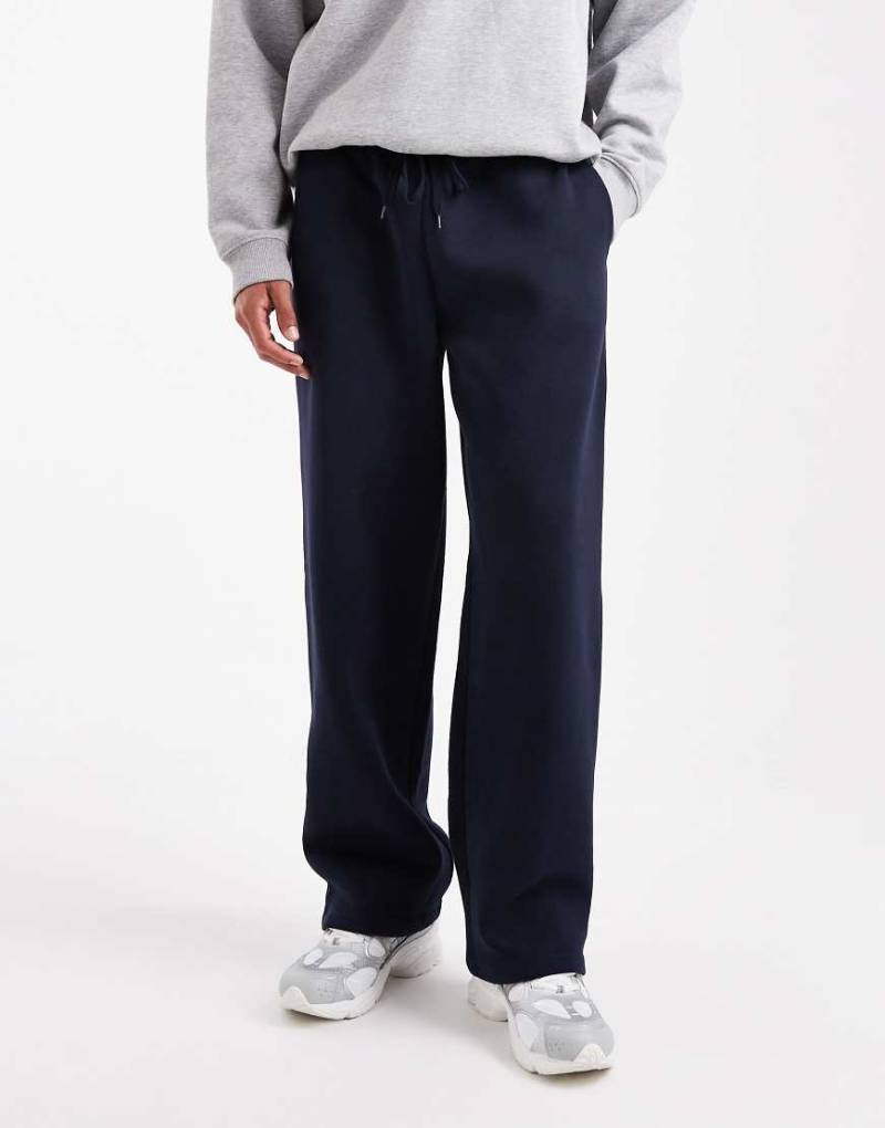 ASOS DESIGN - Basic-Jogginghose in Marineblau mit weitem Bein von ASOS DESIGN