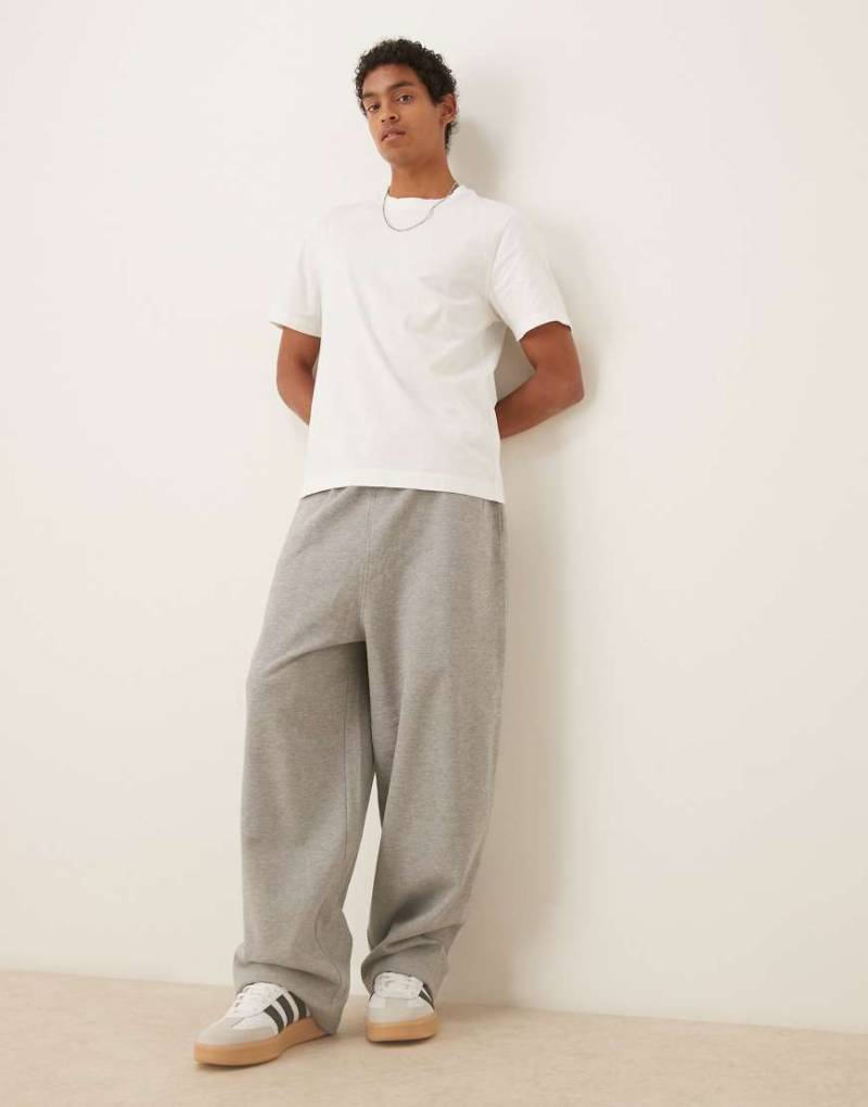 ASOS DESIGN - Basic-Jogginghose in meliertem Grau mit Balloon-Oversize-Schnitt von ASOS DESIGN