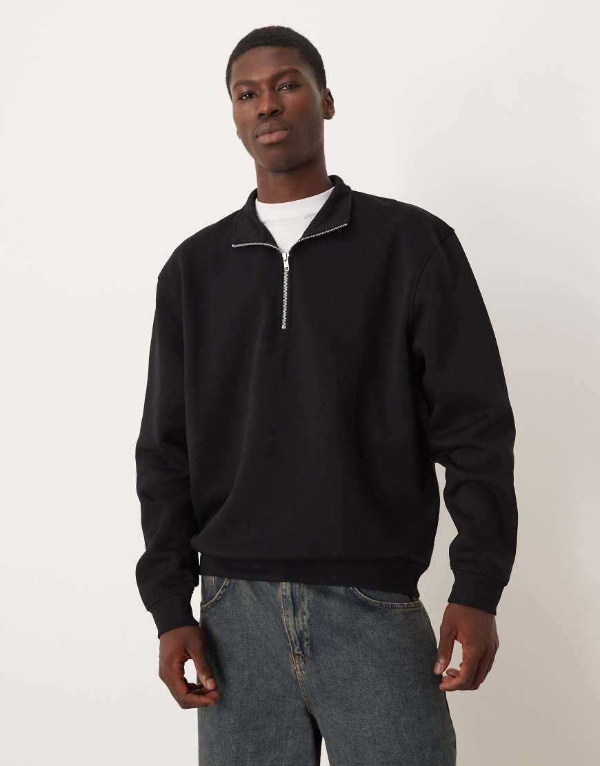 ASOS DESIGN - Basic-Sweatshirt im Relaxed Fit in Schwarz mit kurzem Reißverschluss von ASOS DESIGN