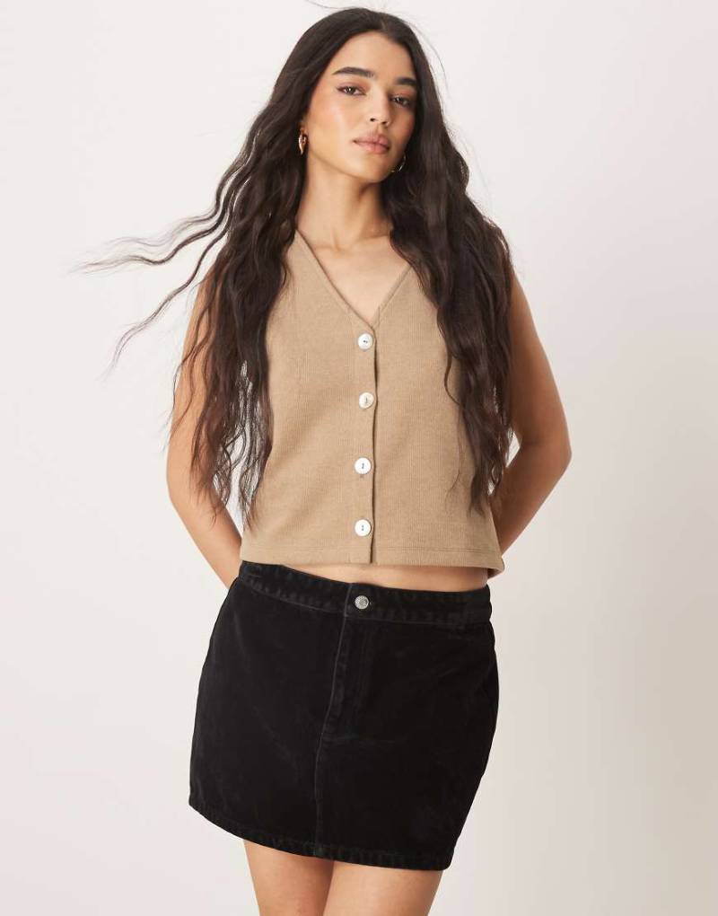 ASOS DESIGN - Beflockter Jeans-Minirock in Schwarz von ASOS DESIGN