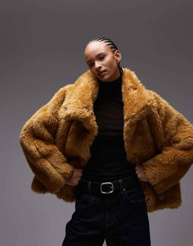 ASOS DESIGN - Bomberjacke aus Kunstpelz in Ocker mit Ballonsaum-Orange von ASOS DESIGN