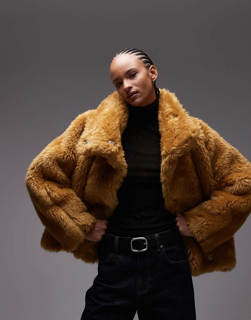 ASOS DESIGN - Bomberjacke aus Kunstpelz in Ocker mit Ballonsaum-Orange von ASOS DESIGN