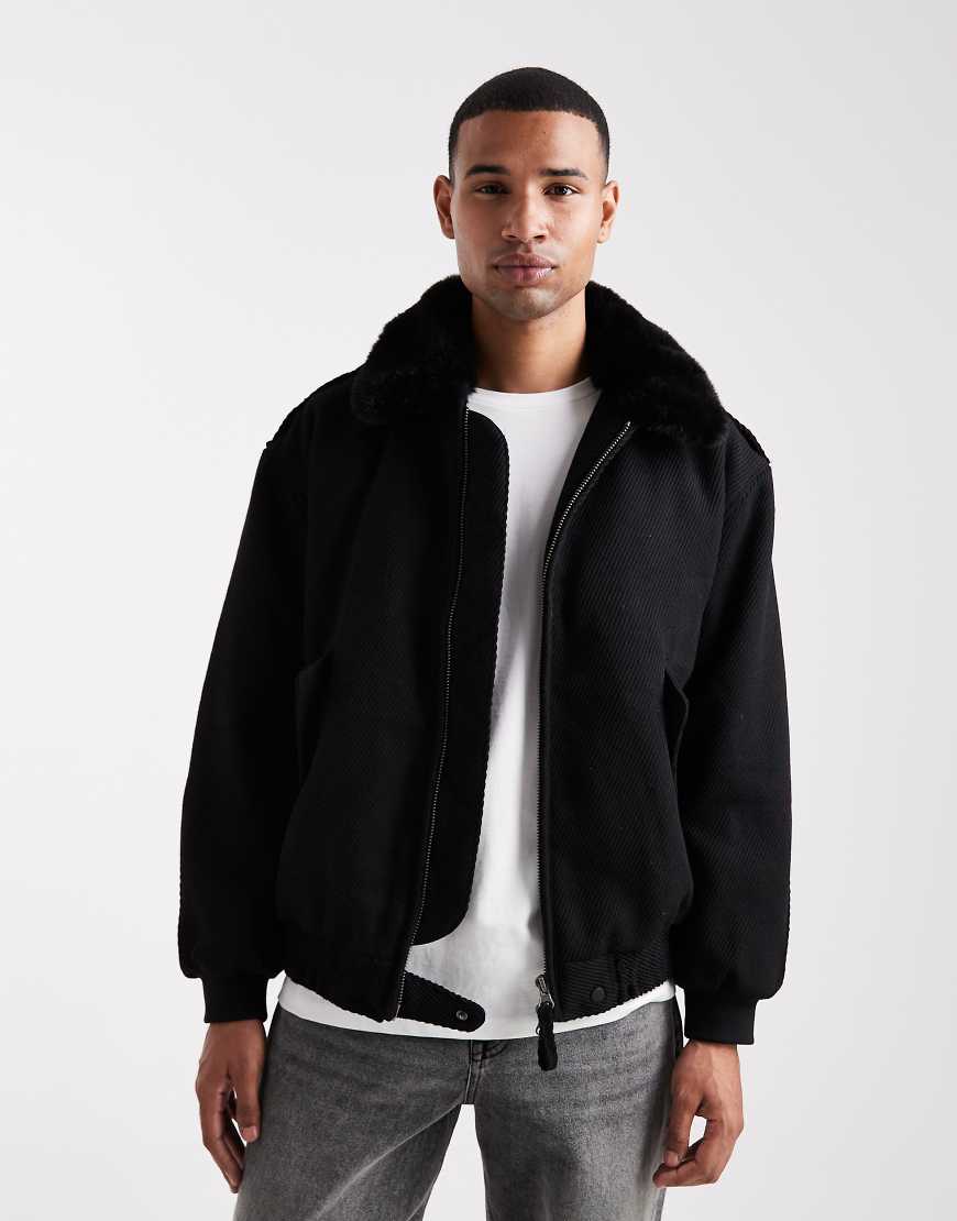 ASOS DESIGN - Bomberjacke in schwarzer Wolloptik mit Kunstpelz-Kragen von ASOS DESIGN
