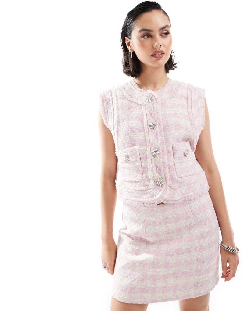 ASOS DESIGN - Bouclé-Weste in Rosa mit unverarbeitetem Saum und Glitzerdetail von ASOS DESIGN